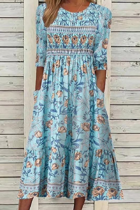 Darcie - Bloemenjurk met losse pasvorm en elegante bedekking van de buik